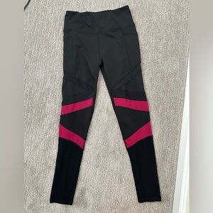 Black Leggings with side pockets and magenta lined design